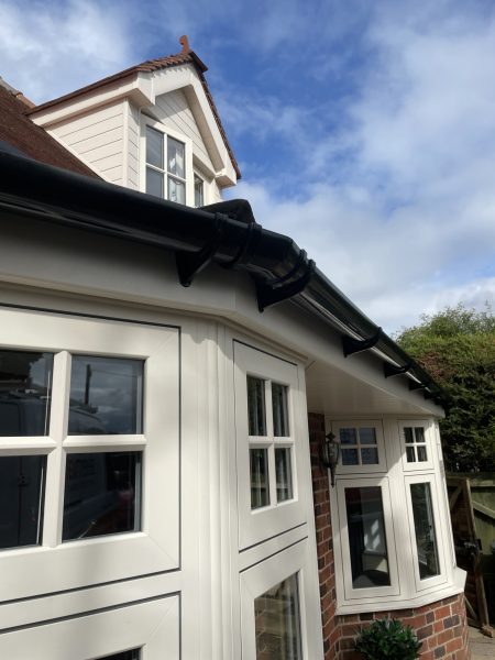 white bow and bay windows